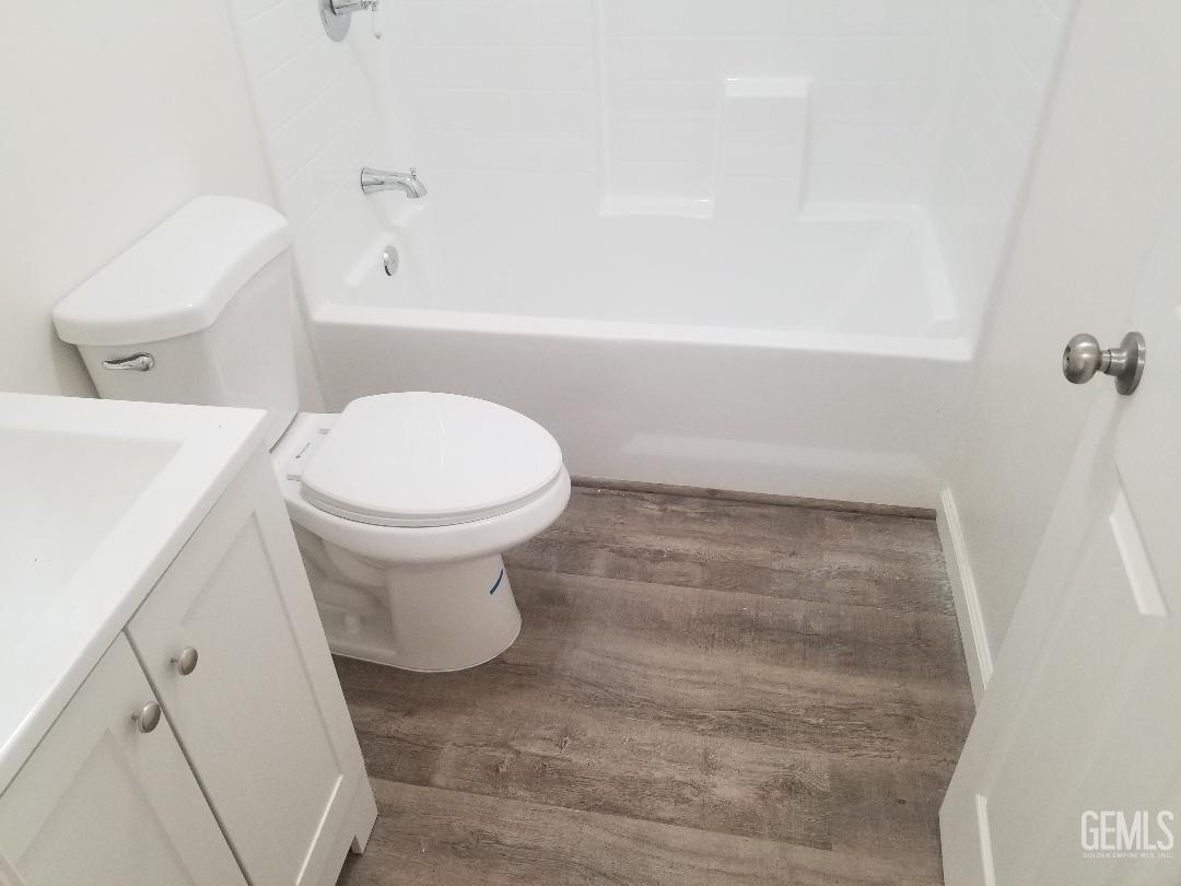 Undisclosed Address Delano, CA 93215 - Photo 10 of 10 a bathroom with a toilet and a bathtub