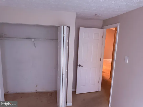 a bathroom with a toilet bathtub and shower