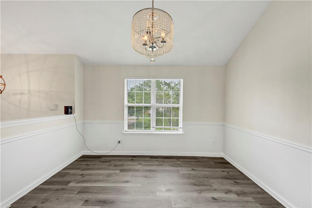 2880 Field Spring Drive Lithonia, GA 30058 - Photo 12 of 31 a view of an empty room with a window