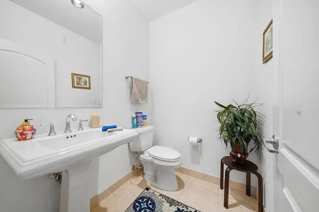a view of storage and utility room with washer and dryer