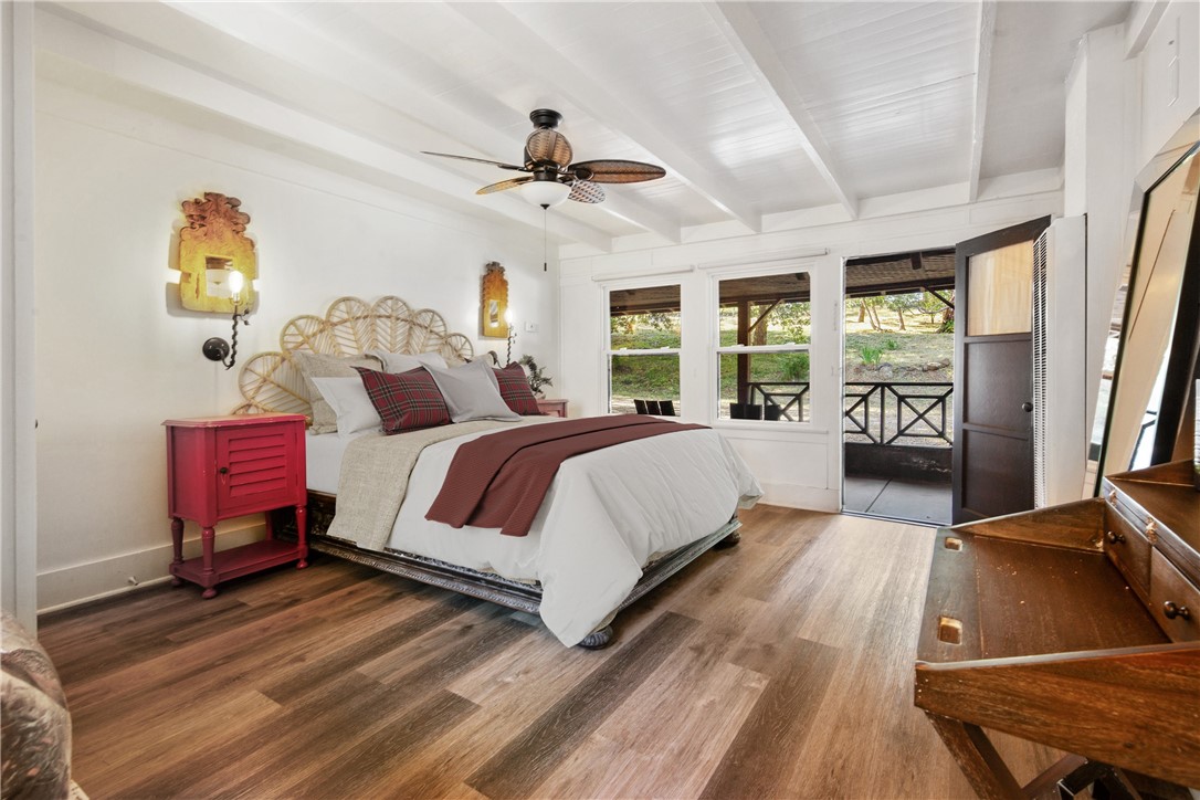 2960 La Posada Way Julian, CA 92036 - Photo 29 of 66 a bedroom with a bed and wooden floor