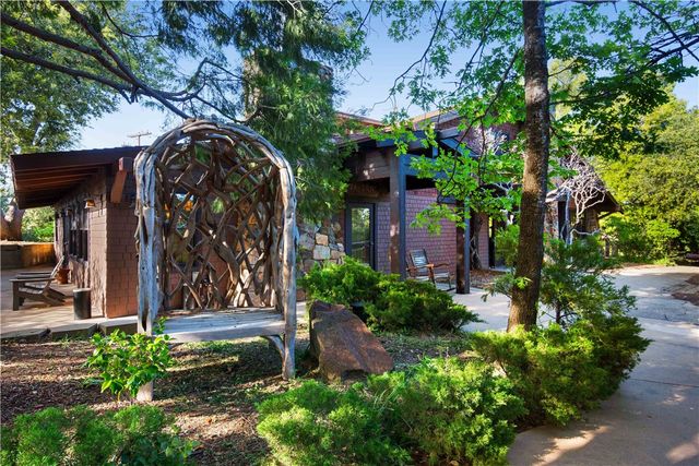 a view of a patio with swimming pool