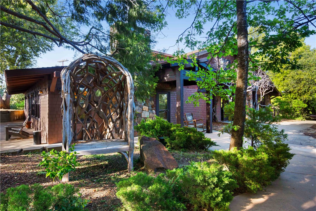 2960 La Posada Way Julian, CA 92036 - Photo 44 of 66 a view of a house with potted plants and a large tree