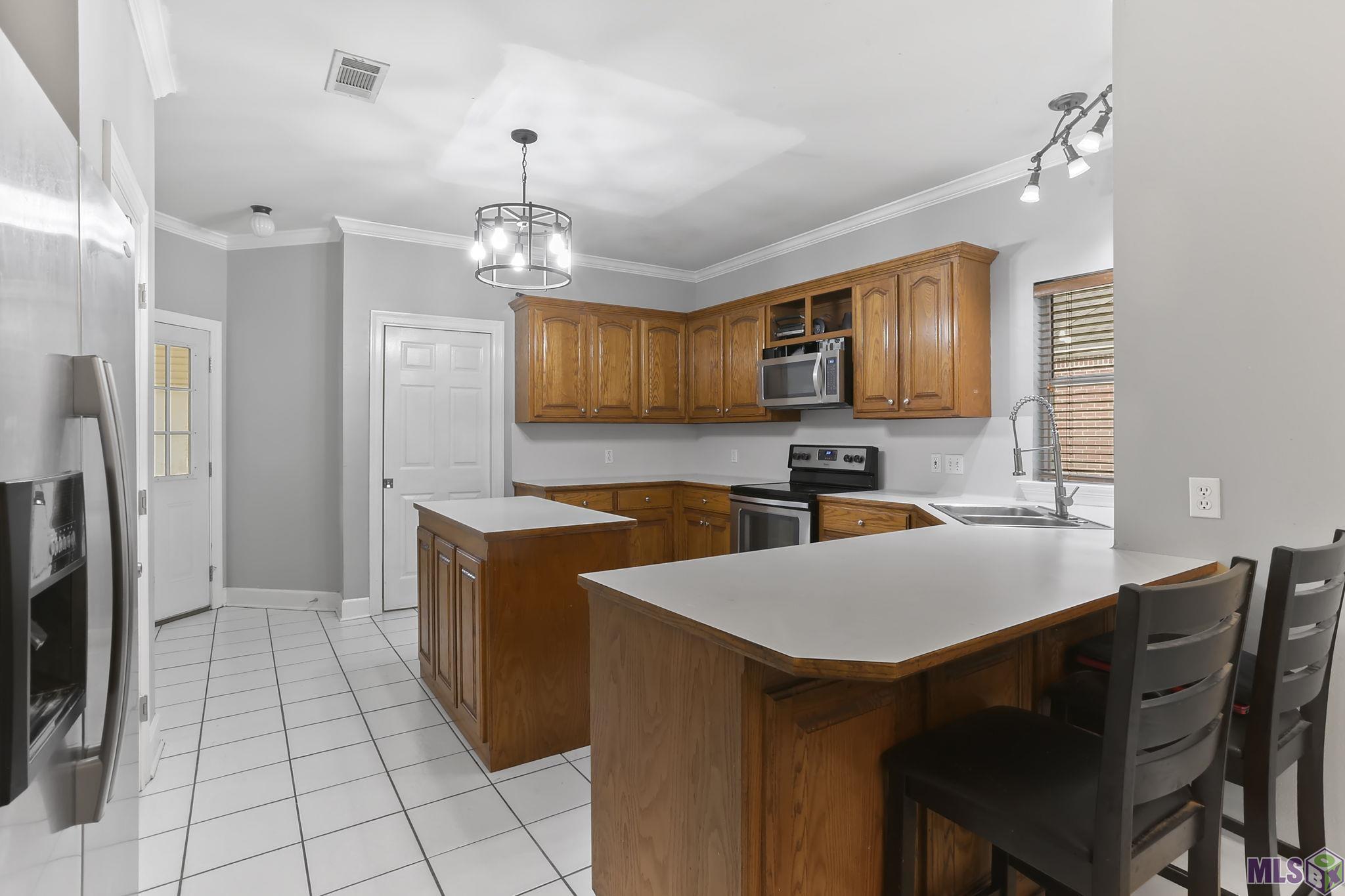 42202 Norwood Road Gonzales, LA 70737 - Photo 7 of 18 kitchen from dining