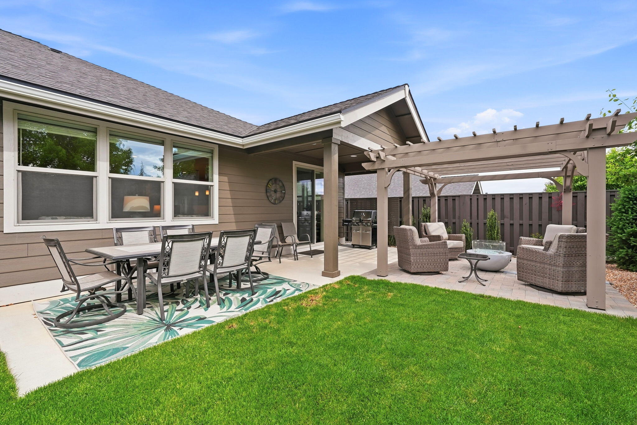 2714 Northwest 23rd Street Redmond, OR 97756 - Photo 50 of 57 a view of a house with a backyard and chairs