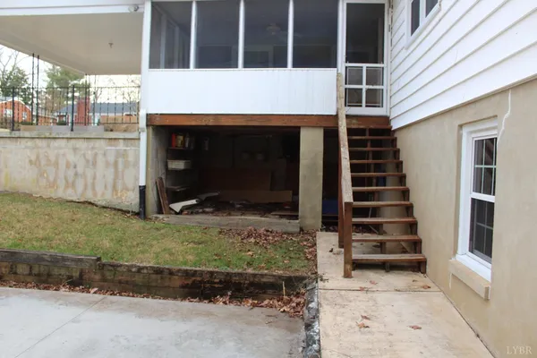 a kitchen with a sink and a stove top oven