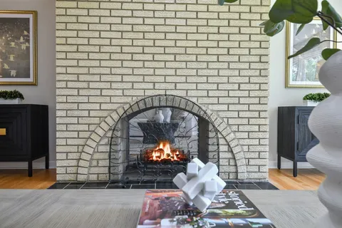 a living room with a fireplace