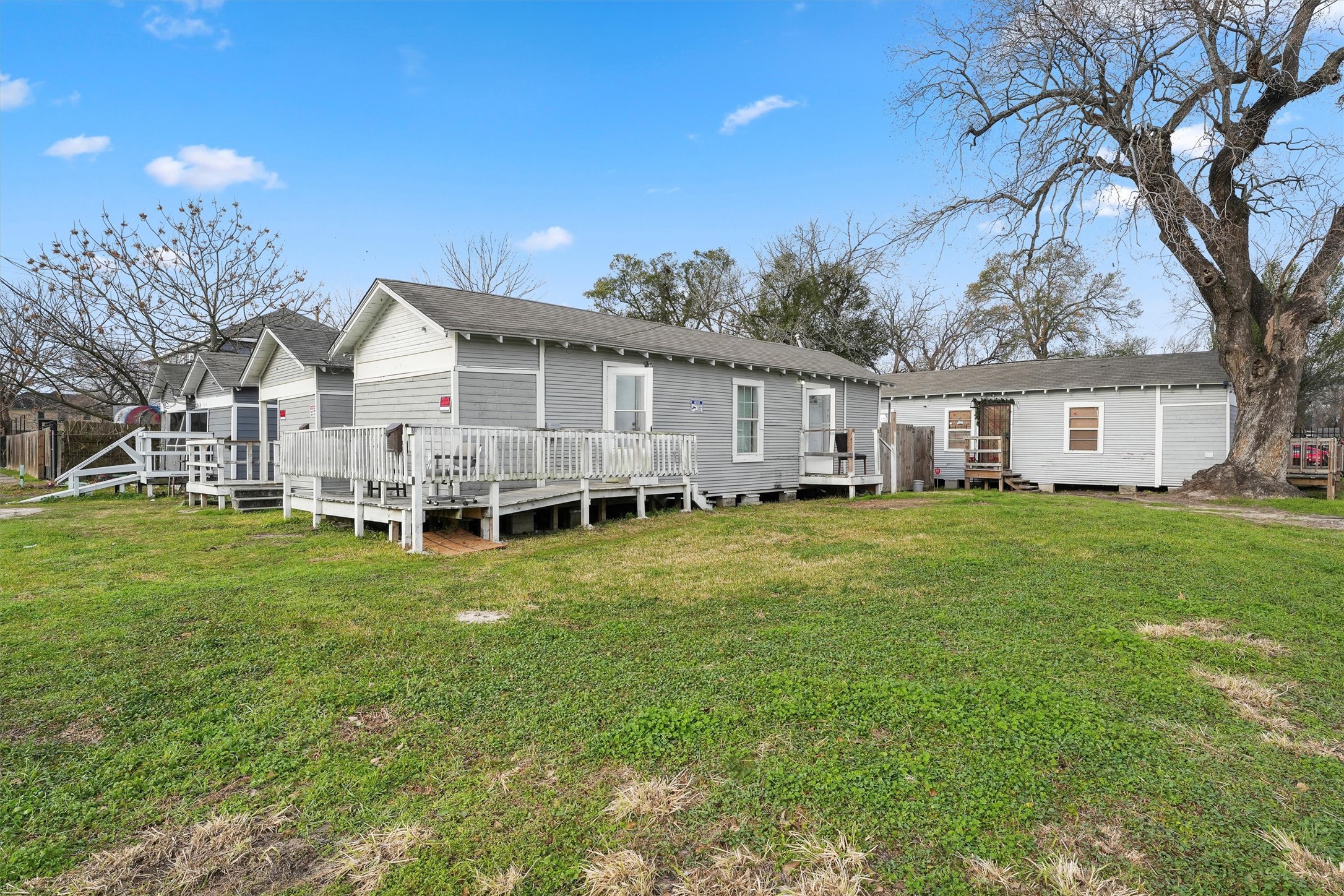 3706 Delano Street Houston, TX 77004 - Photo 14 of 21 a view of a house with a yard view and a patio