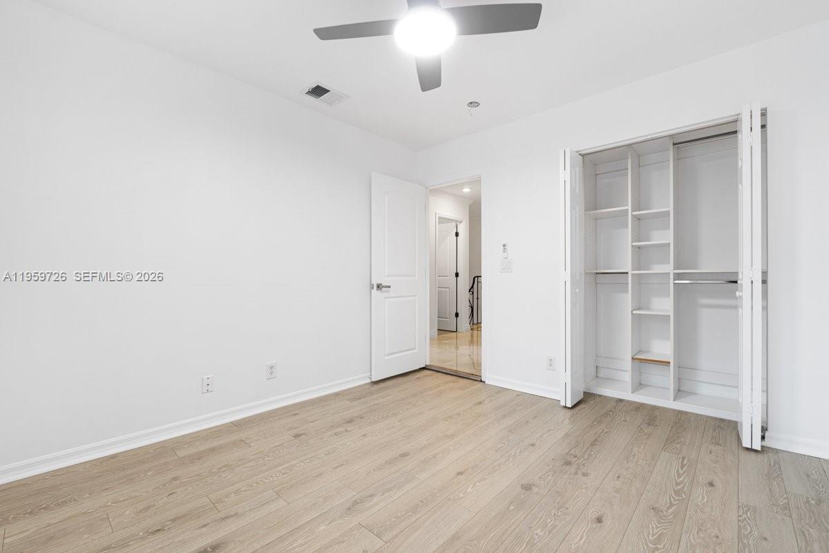 4978 Southwest 35th Terrace Hollywood, FL 33312 - Photo 18 of 24 wooden floor in an empty room
