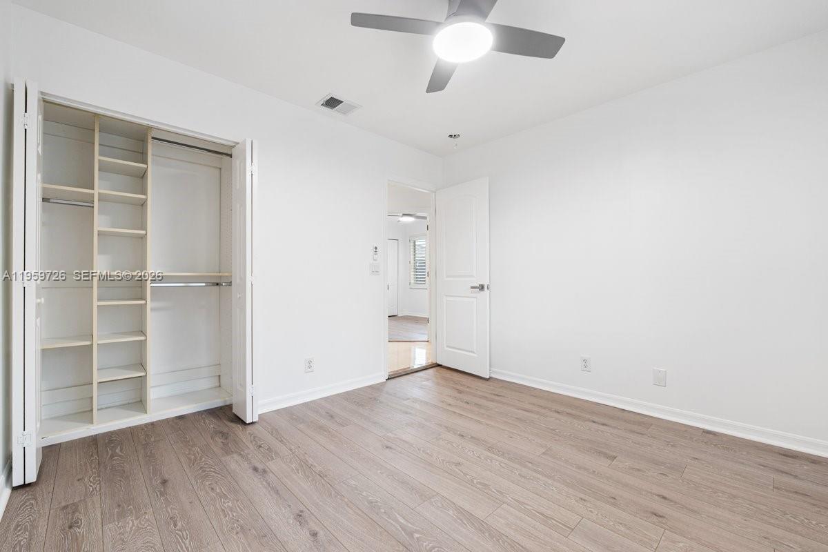 4978 Southwest 35th Terrace Hollywood, FL 33312 - Photo 20 of 24 wooden floor in an empty room with a window