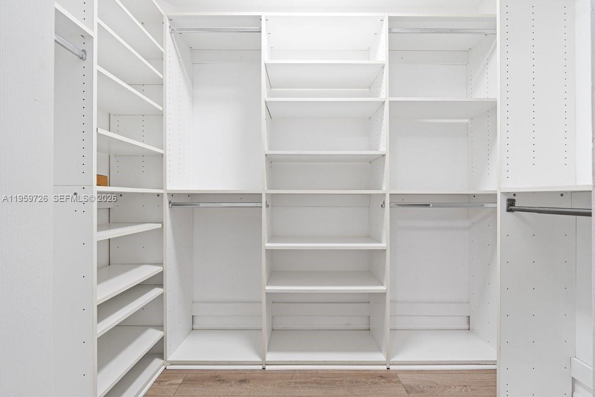 4978 Southwest 35th Terrace Hollywood, FL 33312 - Photo 22 of 24 a view of walk in closet with empty racks