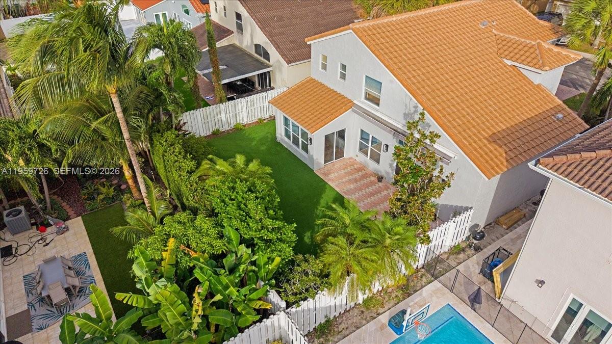 4978 Southwest 35th Terrace Hollywood, FL 33312 - Photo 5 of 24 an aerial view of a house with a yard
