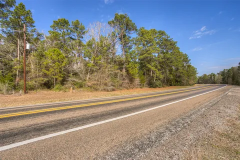$450,000 | 694 Farm To Market 2296, Huntsville, TX 77340