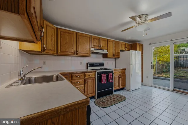 a bathroom with a sink toilet and vanity