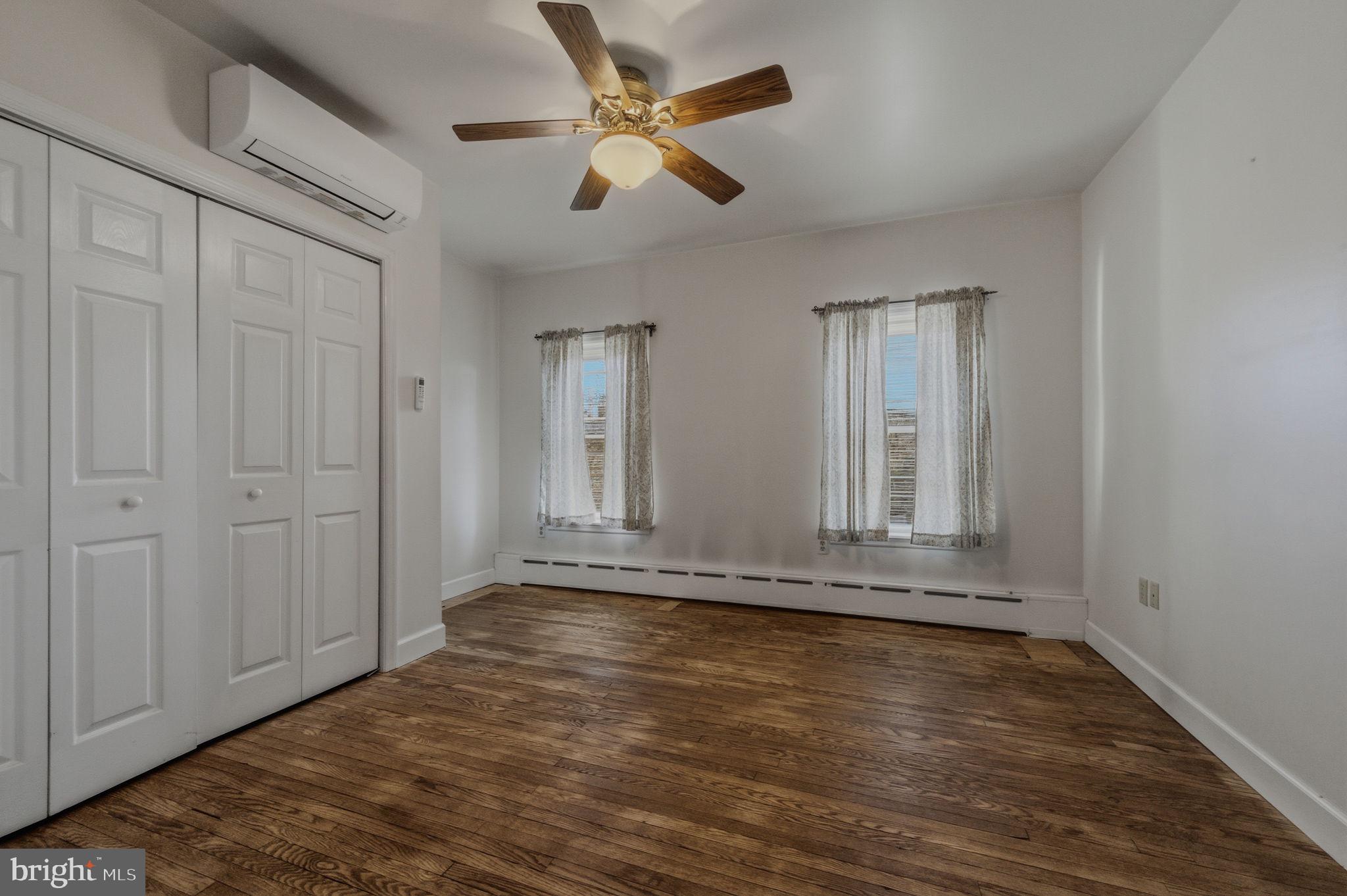 1905 North Scott Street Wilmington, DE 19806 - Photo 20 of 29 a view of an empty room with window and wooden floor