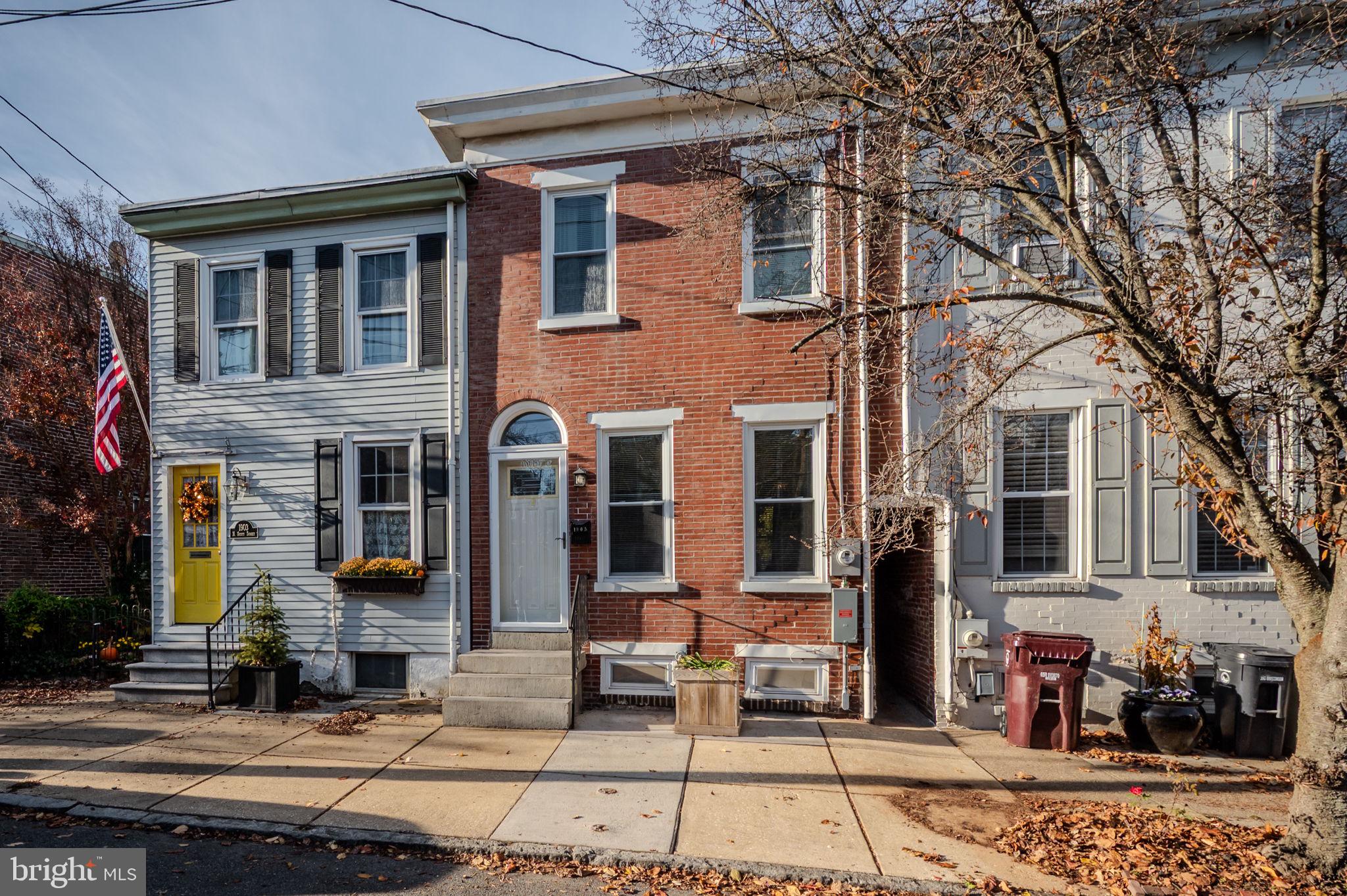 1905 North Scott Street Wilmington, DE 19806 - Photo 27 of 29 a view of a brick house with many windows next to a road