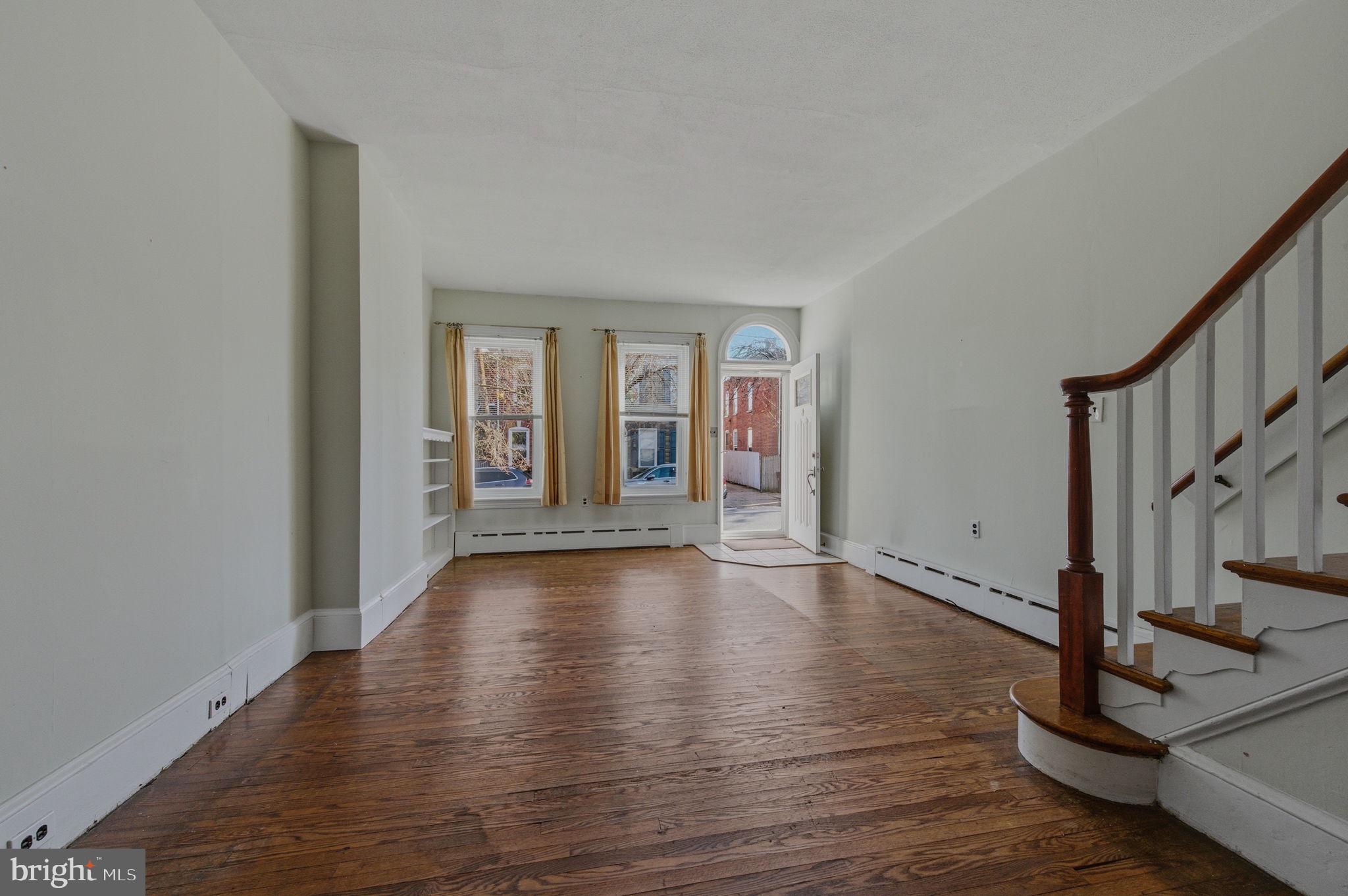 1905 North Scott Street Wilmington, DE 19806 - Photo 4 of 29 a view of an entryway with wooden floor and door