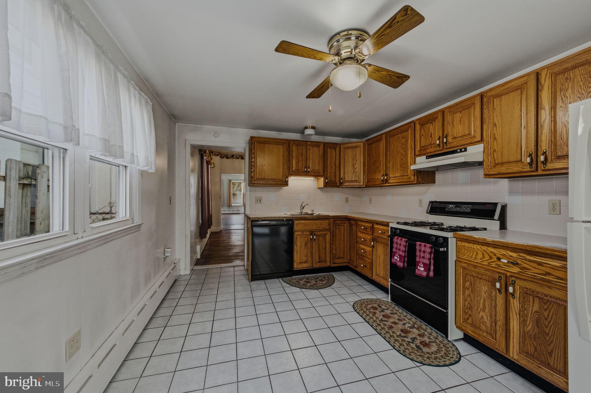 1905 North Scott Street Wilmington, DE 19806 - Photo 10 of 29 a kitchen with a cabinets appliances and a counter top space