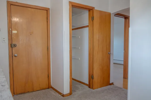 a bathroom with a glass door