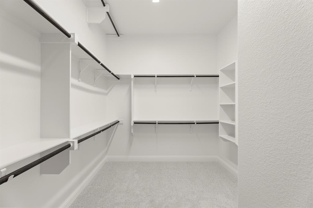 3802 Windmere Drive Rowlett, TX 75088 - Photo 19 of 34 a view of an empty walk in closet