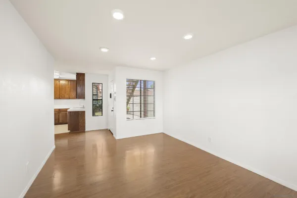 a view of a living room with windows