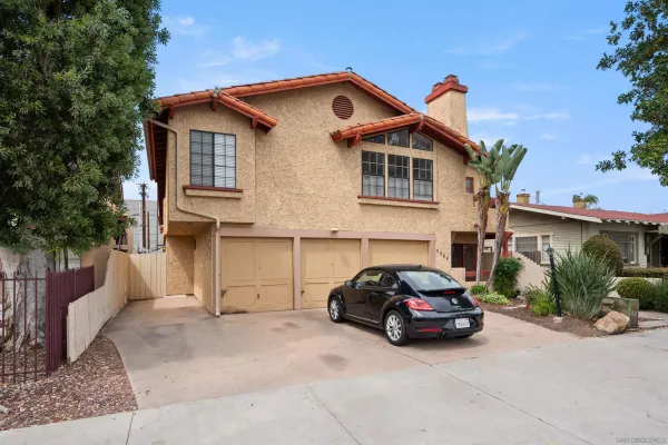 a car parked in front of a house