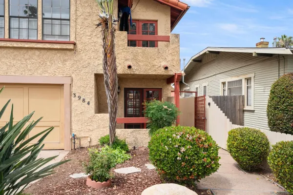 front view of a house with a small yard