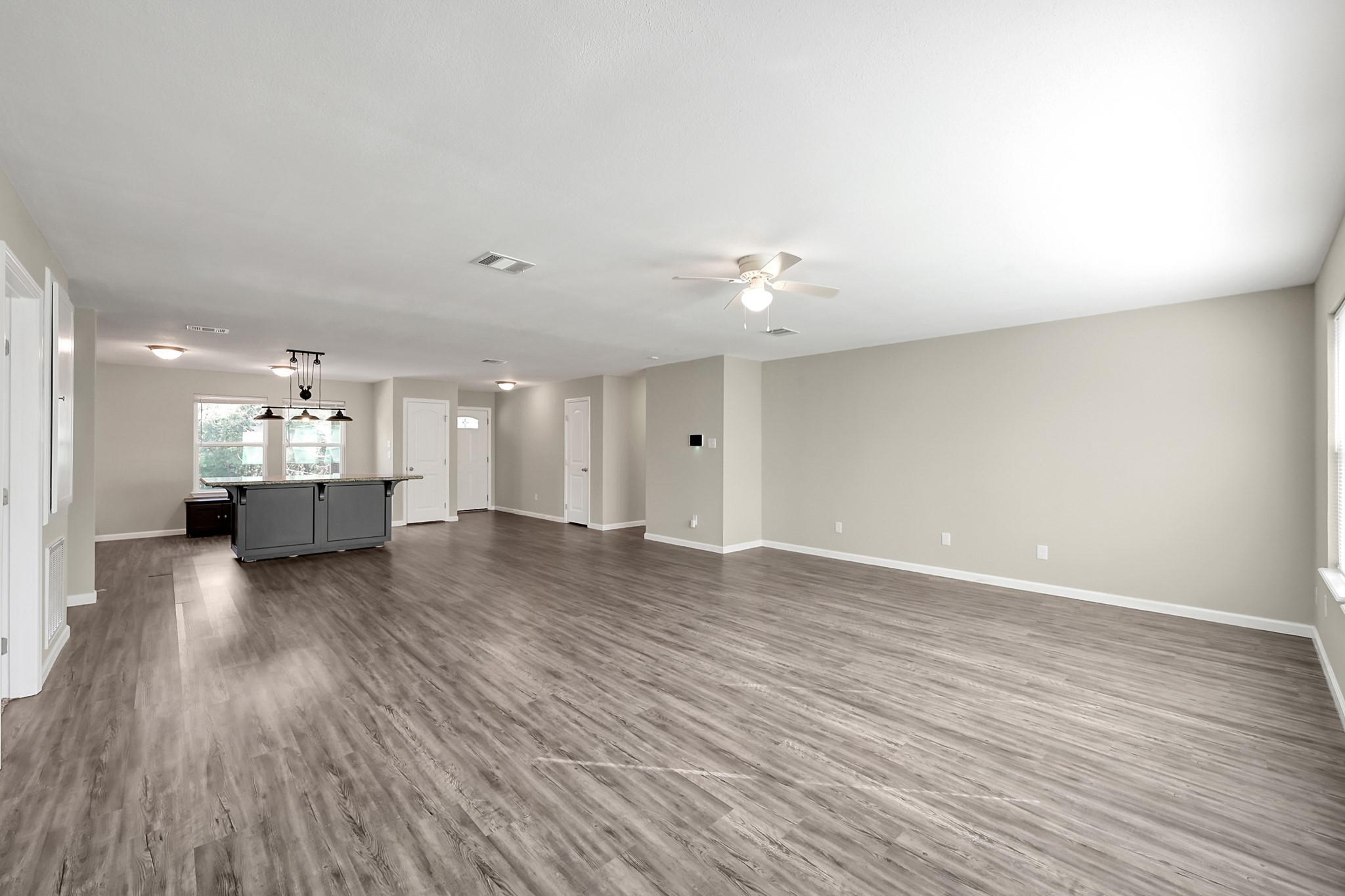 3527 Gary Lane Spring, TX 77380 - Photo 12 of 47 a view of kitchen and hall with wooden floor