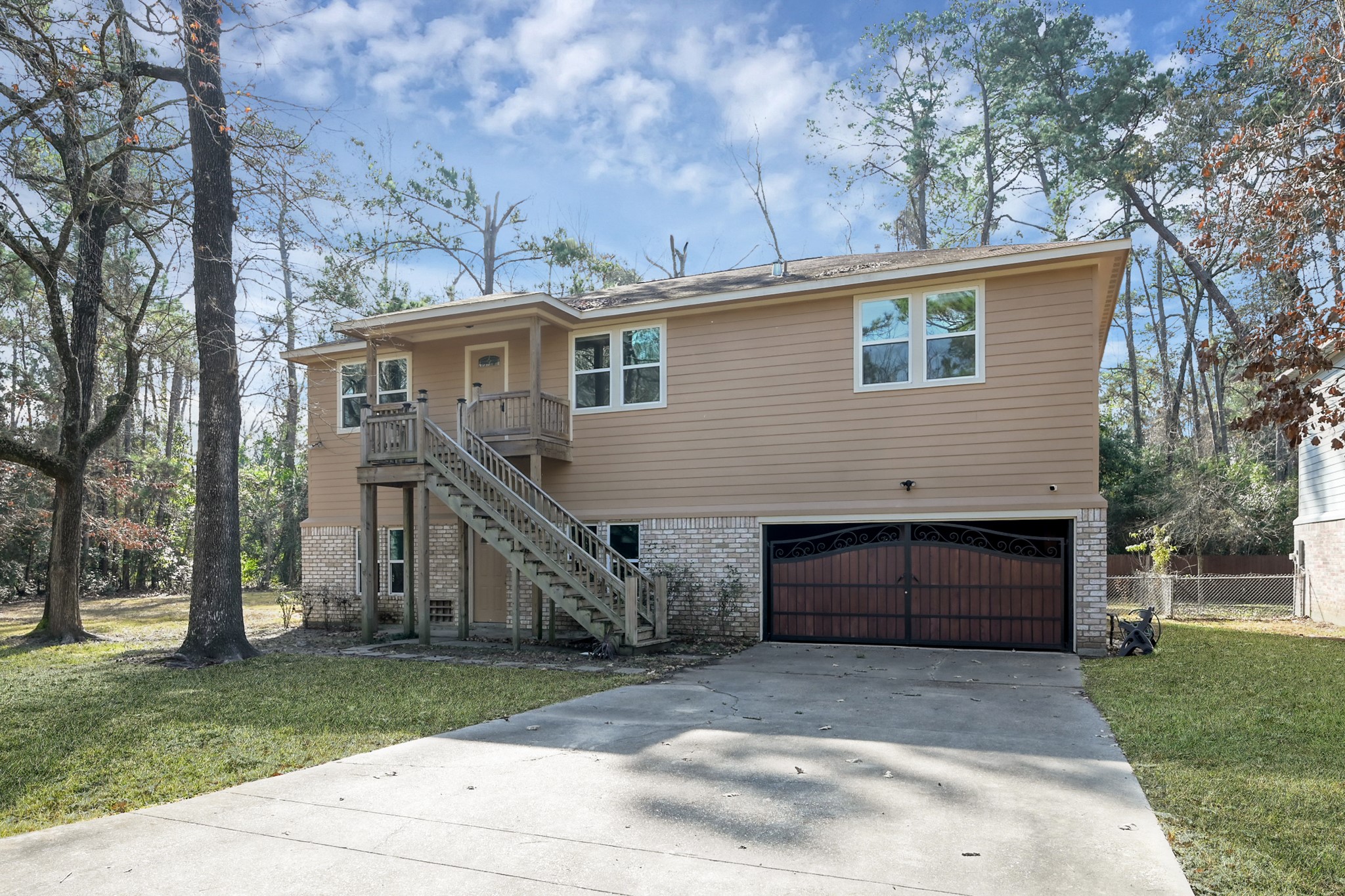 3527 Gary Lane Spring, TX 77380 - Photo 2 of 47 a front view of a house with a yard and garage