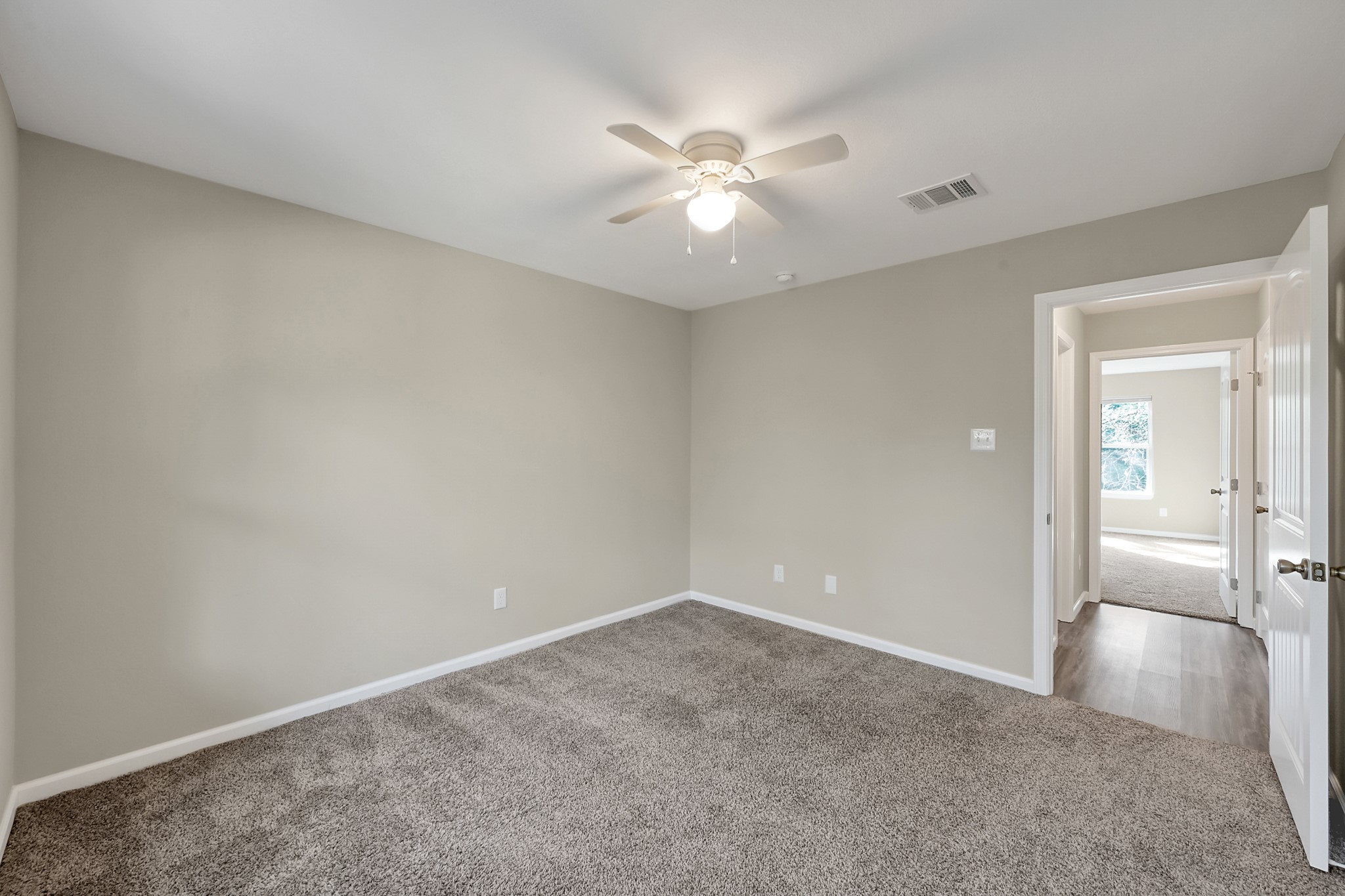 3527 Gary Lane Spring, TX 77380 - Photo 22 of 47 wooden floor in an empty room and a chandelier fan