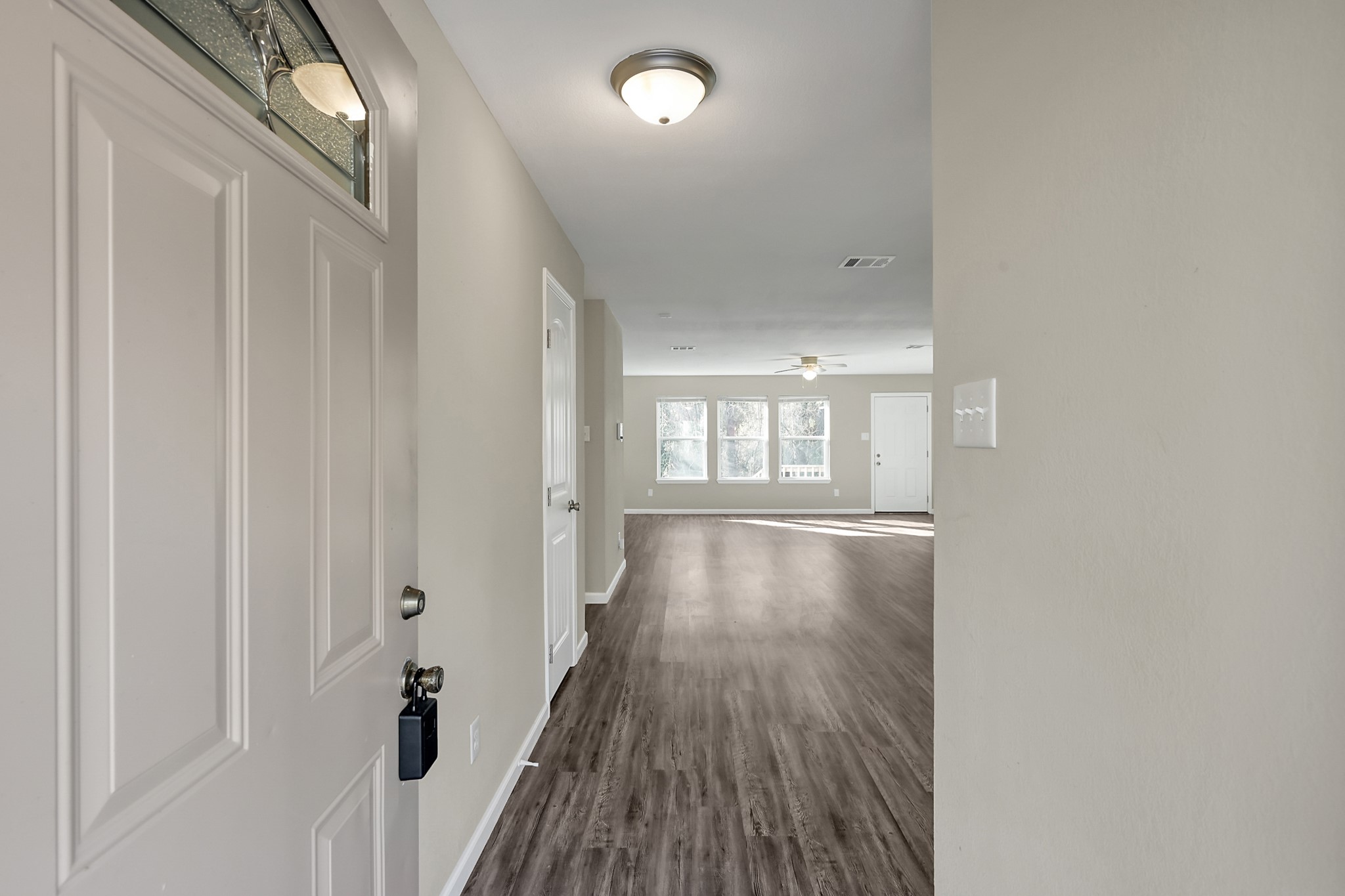 3527 Gary Lane Spring, TX 77380 - Photo 4 of 47 a view of an empty room with wooden floor and a window