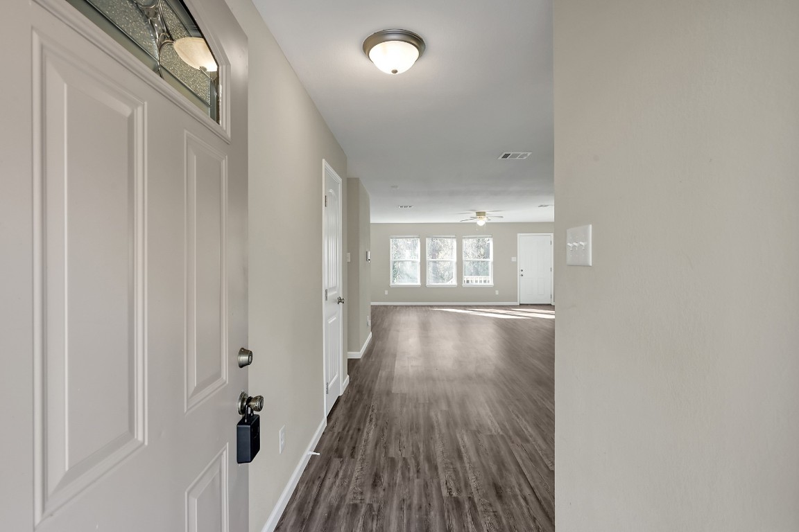 3527 Gary Lane Spring, TX 77380 - Photo 4 of 47 a view of an empty room with wooden floor and a window