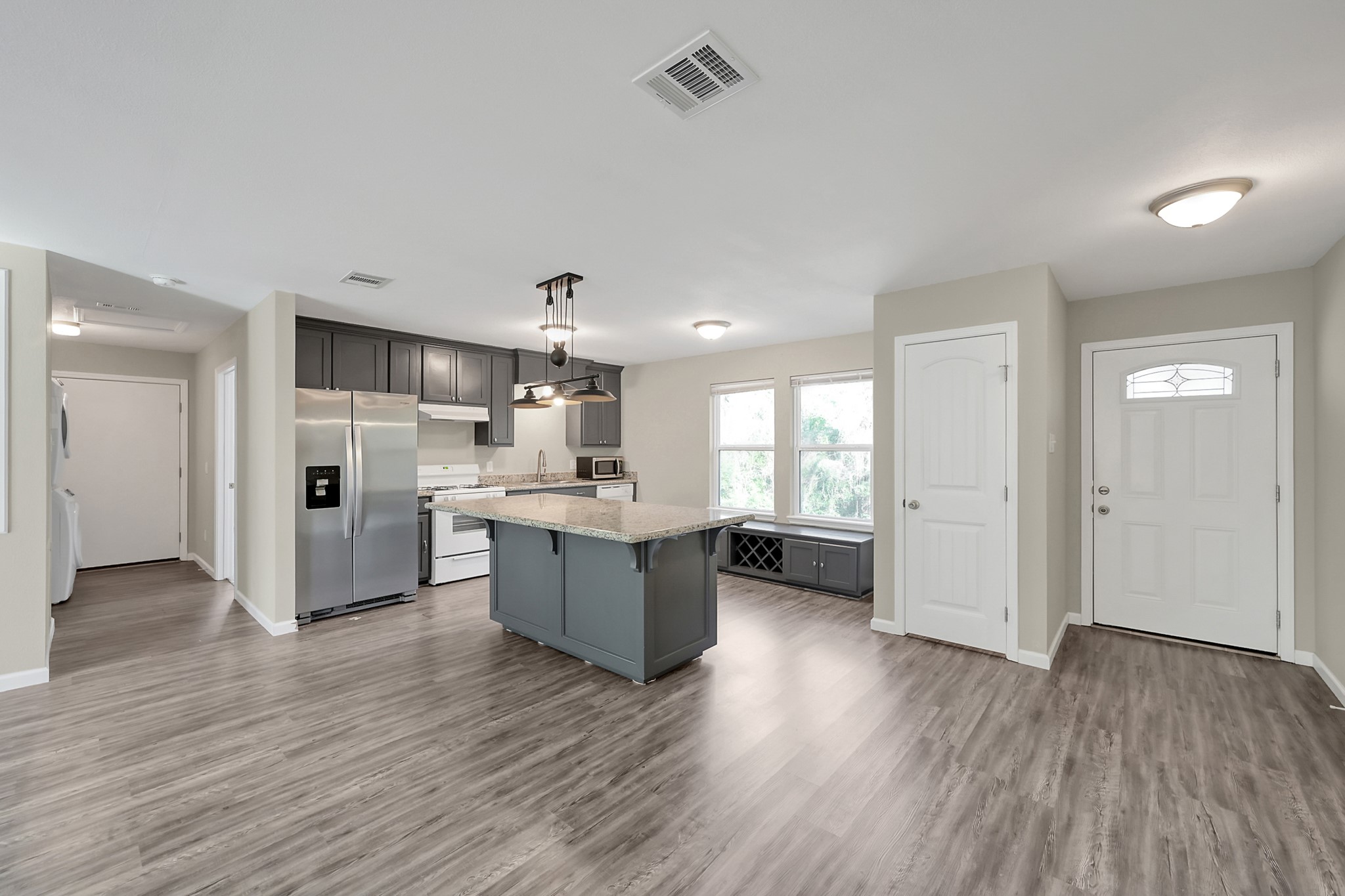 3527 Gary Lane Spring, TX 77380 - Photo 6 of 47 a kitchen with a refrigerator and a sink