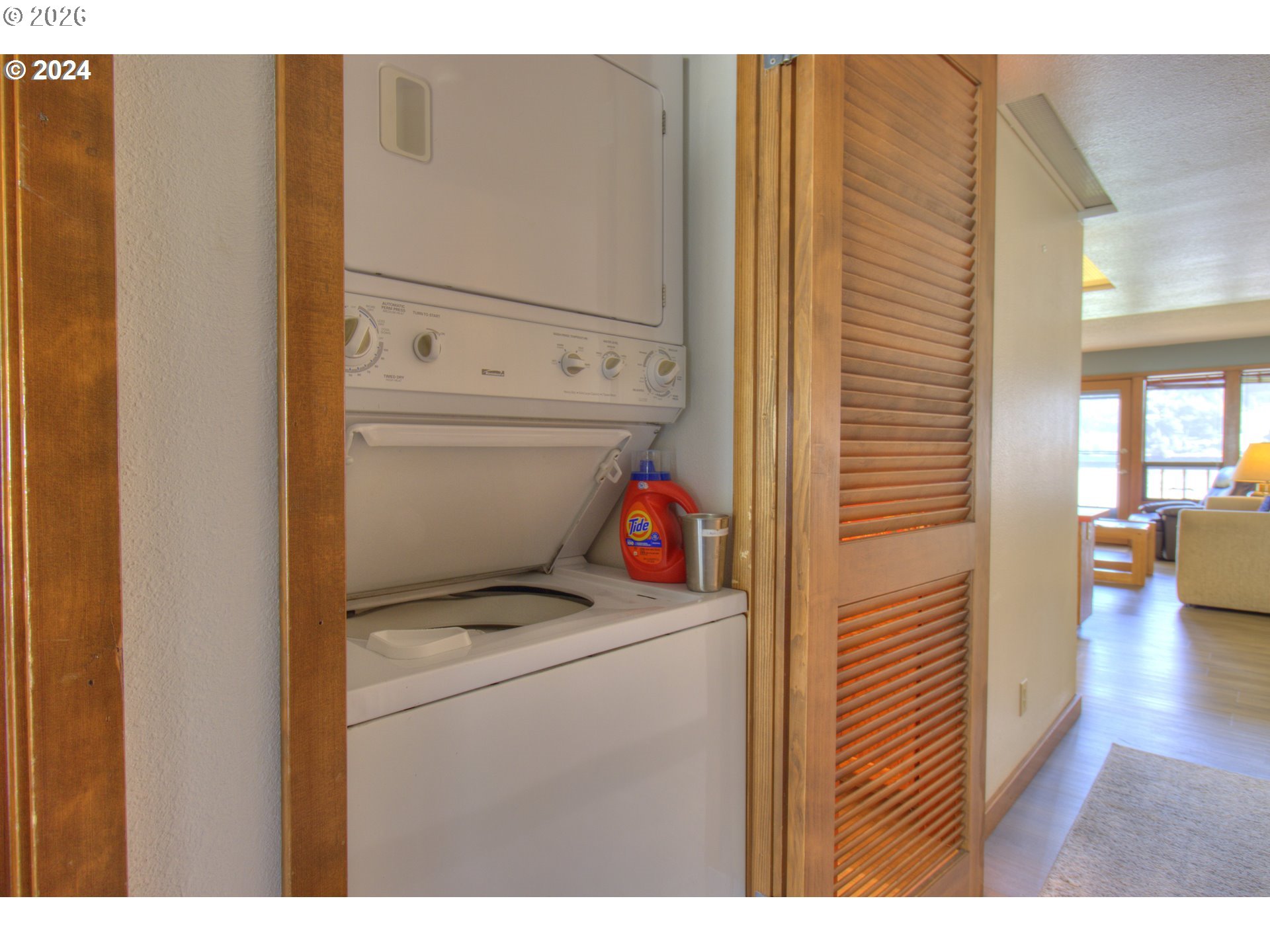 94304 Wedderburn Loop, Unit 419 Gold Beach, OR 97444 - Photo 13 of 23 a utility room with dryer and washer