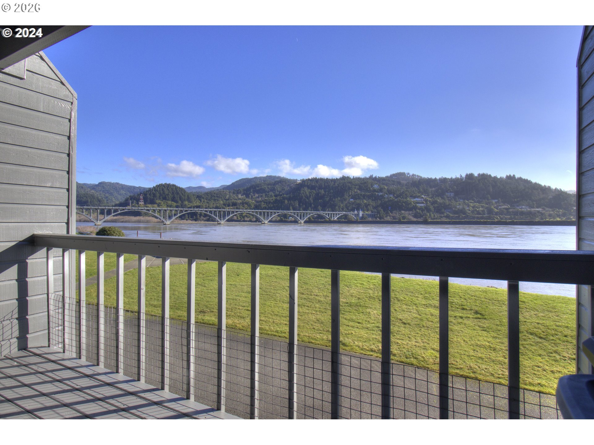94304 Wedderburn Loop, Unit 419 Gold Beach, OR 97444 - Photo 15 of 23 a view of mountain view from a balcony