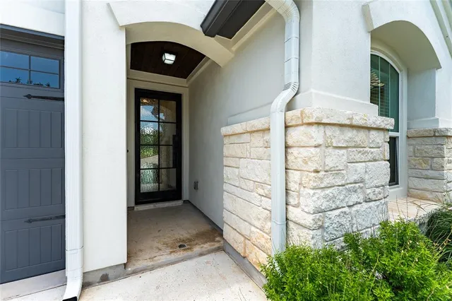 a backyard of a house with lots of green space