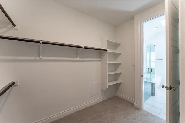 a view of a room with racks on the wall