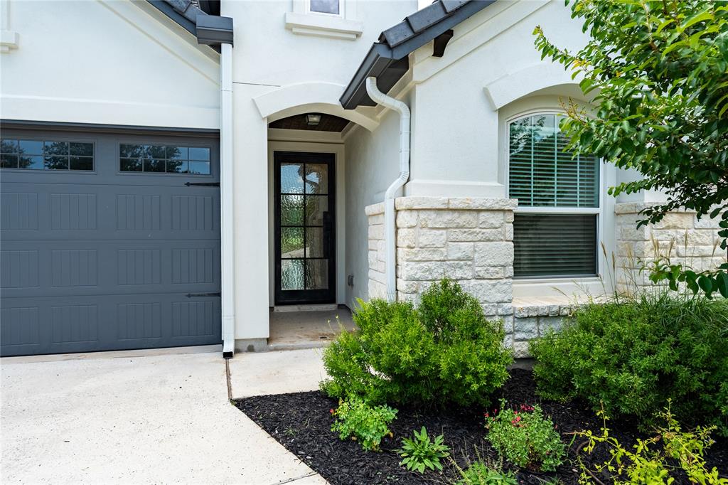 152 Limestone Drive Georgetown, TX 78628 - Photo 3 of 36 a front view of a house with a garage