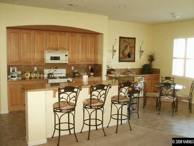 10620 Sterling Ridge Way Reno, NV 89521 - Photo 2 of 6 a view of a dining room with furniture