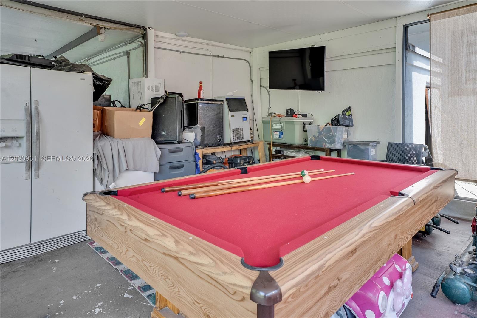 1360 Northwest 77th Street Miami, FL 33147 - Photo 27 of 41 a room with pool table and flat screen tv