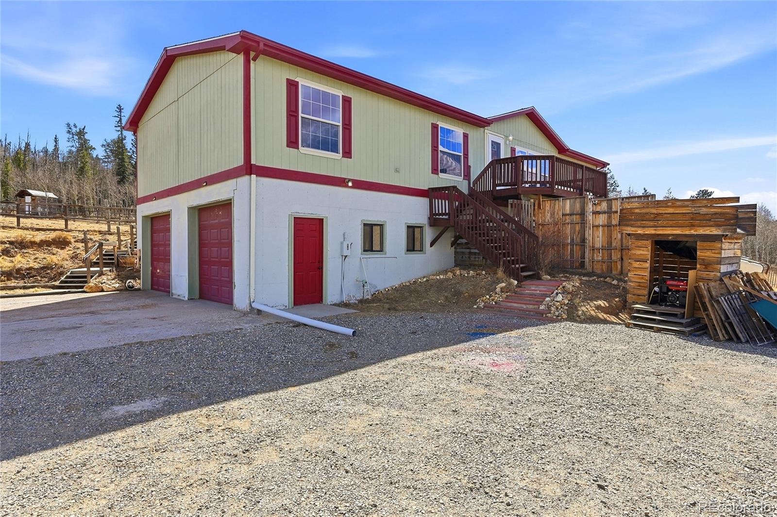 4441 Goldenburg Canyon Road Hartsel, CO 80449 - Photo 3 of 48 a front view of a house with a yard