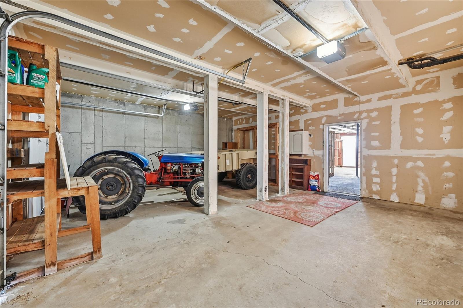 4441 Goldenburg Canyon Road Hartsel, CO 80449 - Photo 34 of 48 a view of a garage with car parked