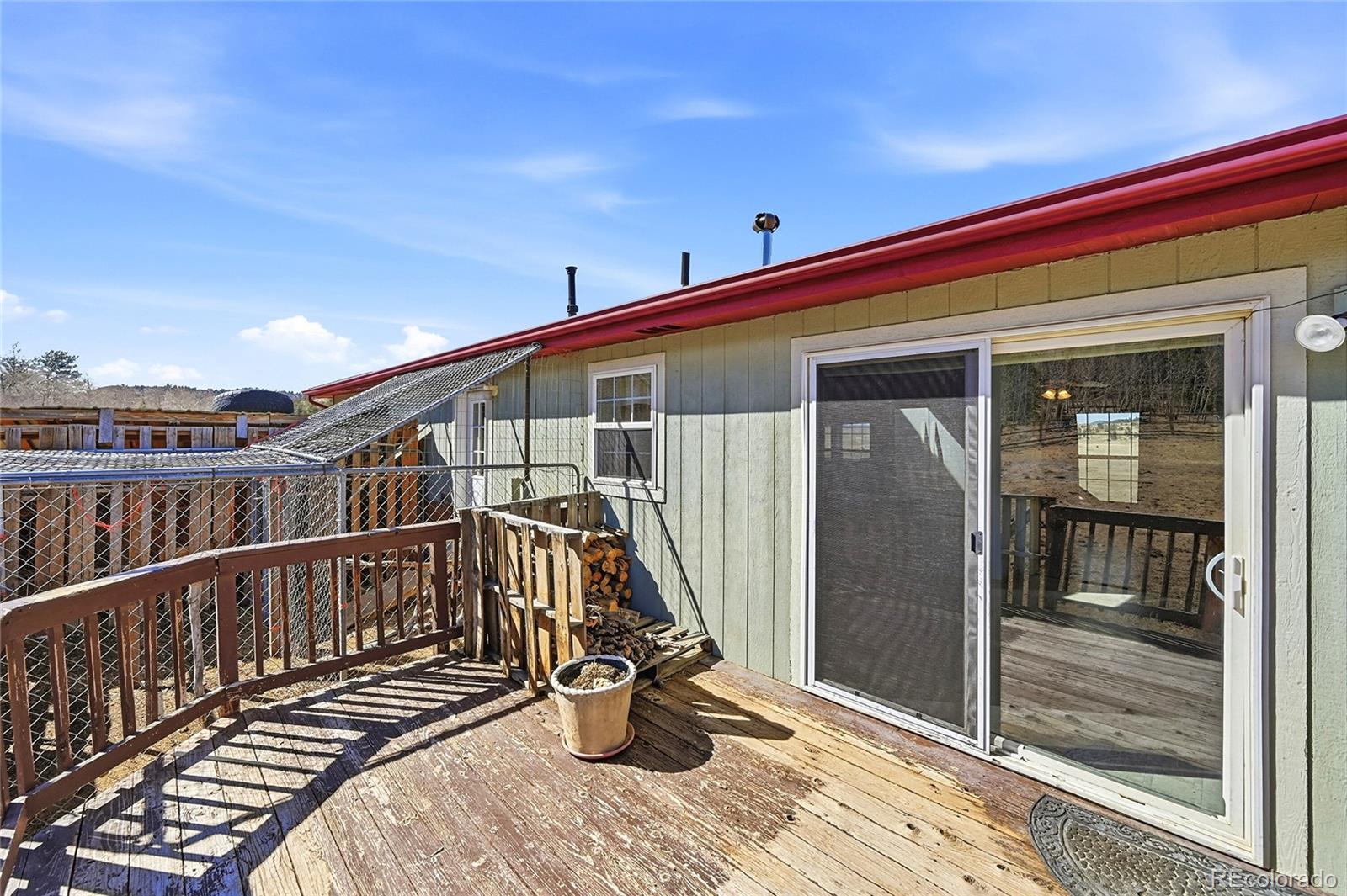 4441 Goldenburg Canyon Road Hartsel, CO 80449 - Photo 36 of 48 a view of balcony with wooden floor and fence