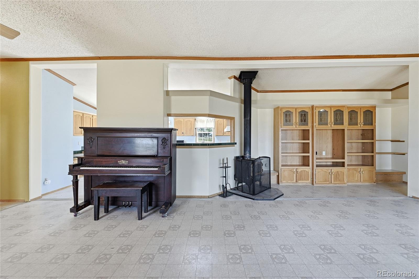 4441 Goldenburg Canyon Road Hartsel, CO 80449 - Photo 7 of 48 a living room with furniture and a flat screen tv