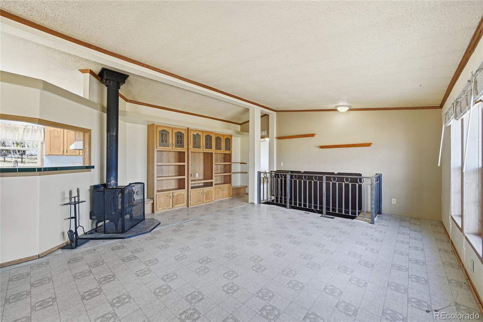 4441 Goldenburg Canyon Road Hartsel, CO 80449 - Photo 8 of 48 a view of an empty room with a window