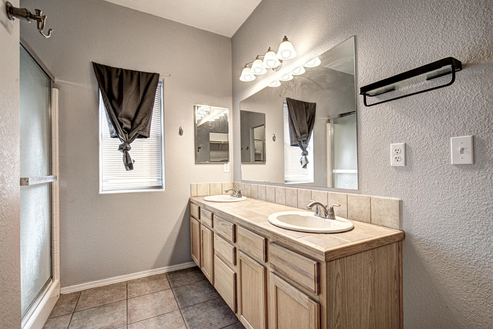 334 East Cedar Mill Road Star Valley, AZ 85541 - Photo 15 of 32 a bathroom with a sink and a mirror