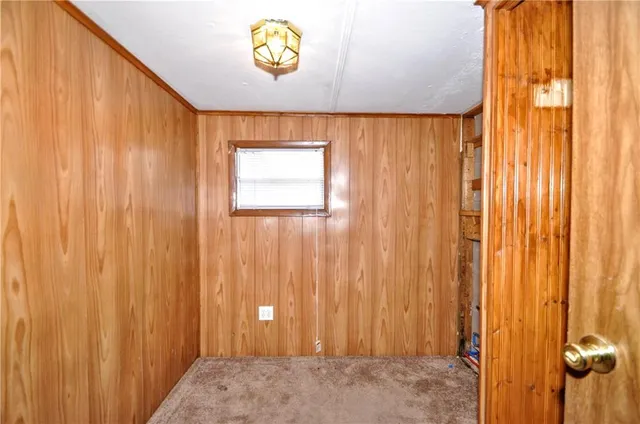 a bathroom with a granite countertop sink toilet and a mirror