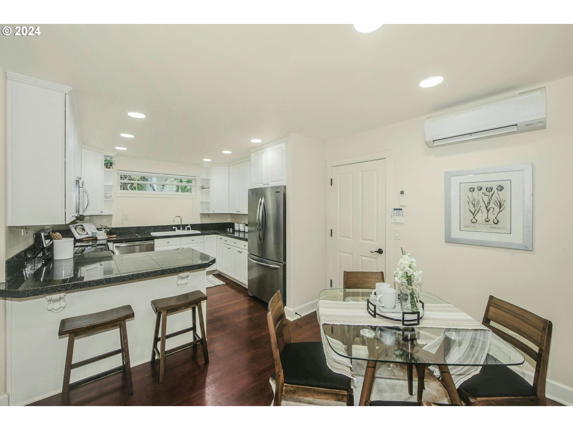 2324 Northwest Miller Road Portland, OR 97229 - Photo 12 of 29 a living room with stainless steel appliances kitchen island granite countertop furniture and a view of kitchen