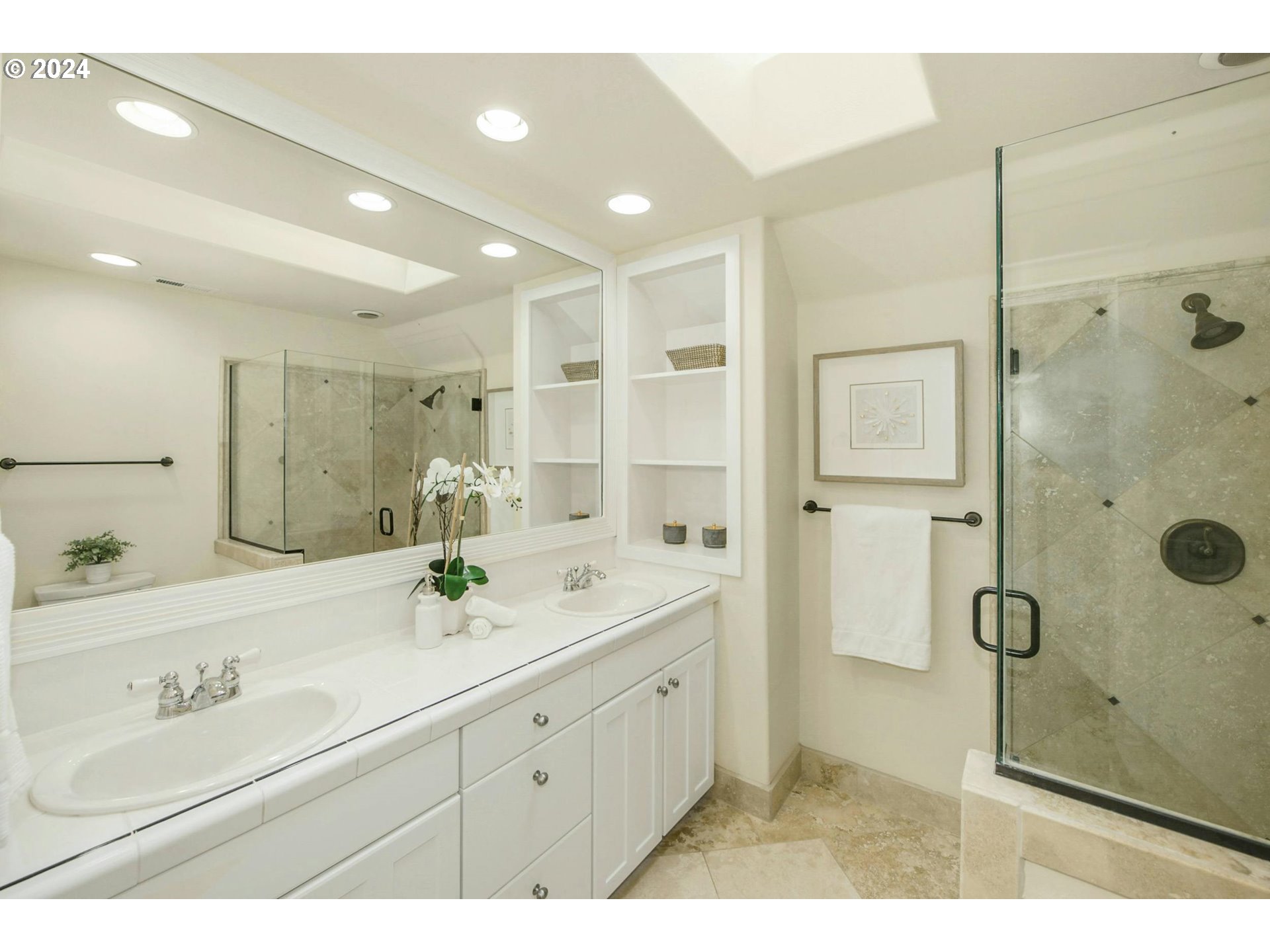 2324 Northwest Miller Road Portland, OR 97229 - Photo 19 of 29 a bathroom with a double vanity sink mirror and shower