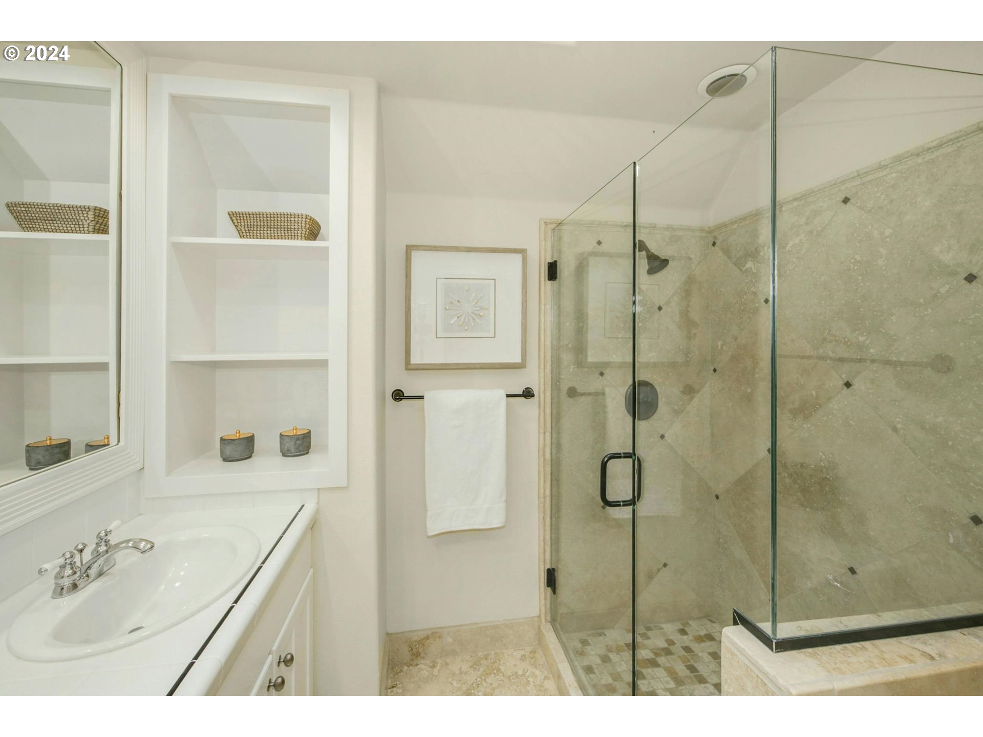 2324 Northwest Miller Road Portland, OR 97229 - Photo 20 of 29 a bathroom with a shower sink and mirror